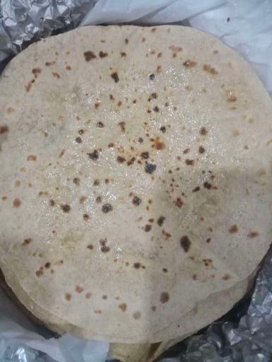 Tasty Tawa Rotis cooked by COOX chefs cooks during occasions parties events at home