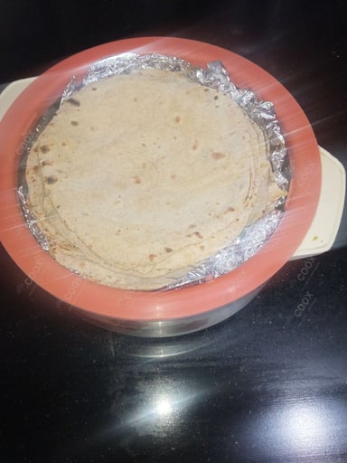 Tasty Tawa Rotis cooked by COOX chefs cooks during occasions parties events at home