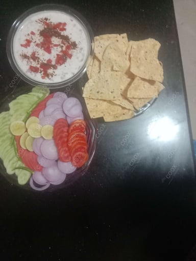 Tasty Mix Veg Raita cooked by COOX chefs cooks during occasions parties events at home