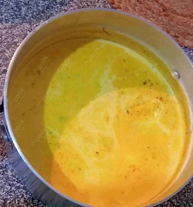 Tasty Hot Kadai Milk cooked by COOX chefs cooks during occasions parties events at home