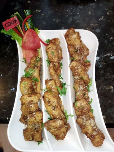 Tasty Fish Orly cooked by COOX chefs cooks during occasions parties events at home