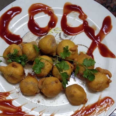Tasty Aloo Bonda cooked by COOX chefs cooks during occasions parties events at home