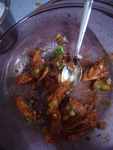 Tasty Chilli Lotus Stem cooked by COOX chefs cooks during occasions parties events at home