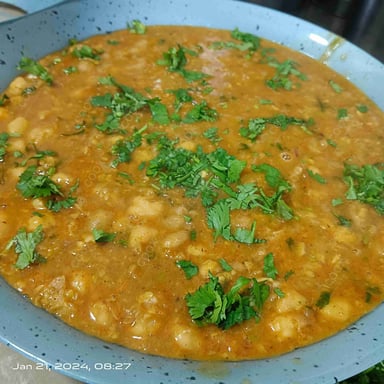 Tasty Chana Bhatura cooked by COOX chefs cooks during occasions parties events at home