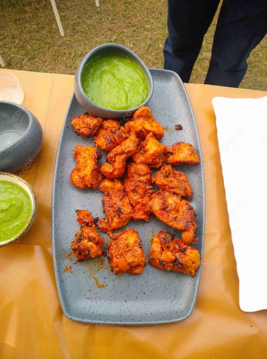 Tasty Chicken Tikka cooked by COOX chefs cooks during occasions parties events at home