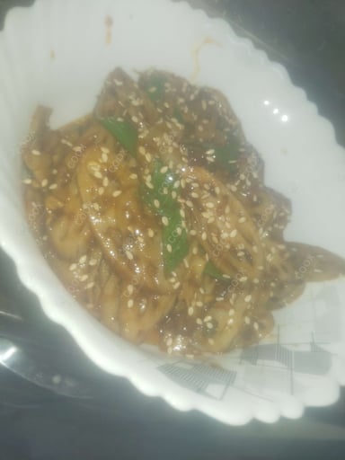 Tasty Chilli Lotus Stem cooked by COOX chefs cooks during occasions parties events at home