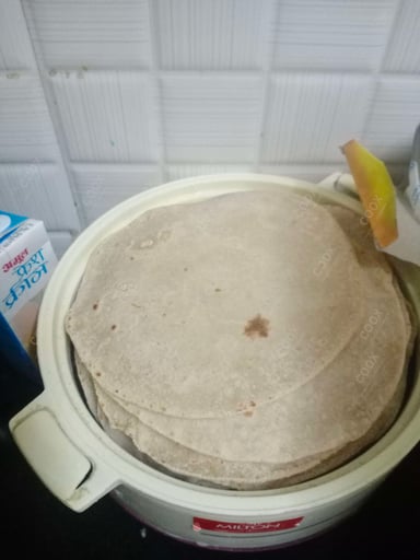 Tasty Tawa Rotis cooked by COOX chefs cooks during occasions parties events at home