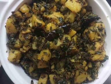 Tasty Aloo Methi cooked by COOX chefs cooks during occasions parties events at home