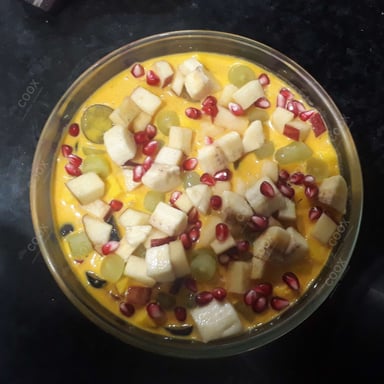 Tasty Fruit Custard cooked by COOX chefs cooks during occasions parties events at home