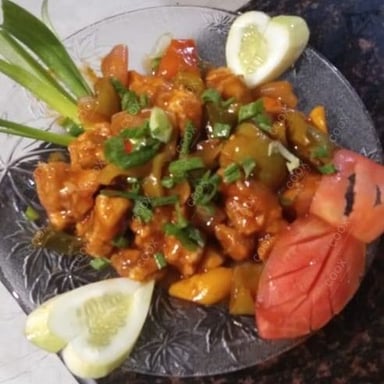 Tasty Chilli  Chicken cooked by COOX chefs cooks during occasions parties events at home