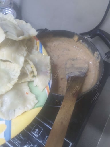 Tasty Ravioli in Pink Sauce cooked by COOX chefs cooks during occasions parties events at home