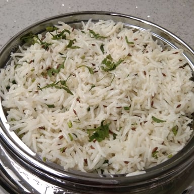 Tasty Jeera Rice cooked by COOX chefs cooks during occasions parties events at home