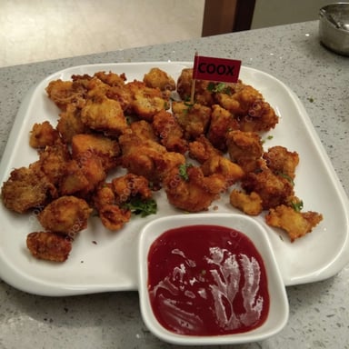 Tasty Amritsari Fish Fry cooked by COOX chefs cooks during occasions parties events at home