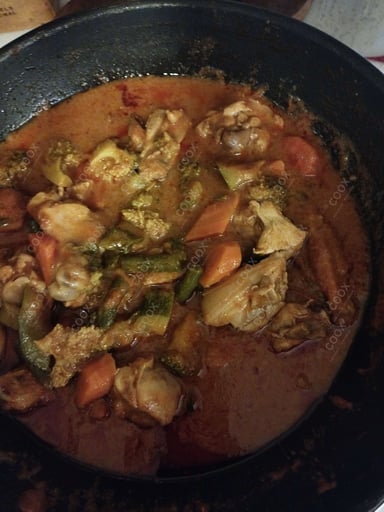 Tasty Red Thai Curry cooked by COOX chefs cooks during occasions parties events at home