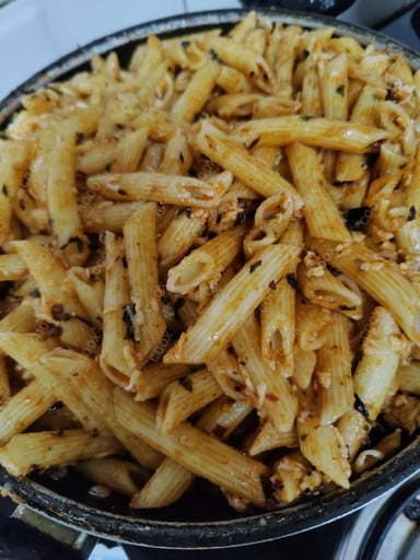 Tasty Pasta in Red Sauce cooked by COOX chefs cooks during occasions parties events at home