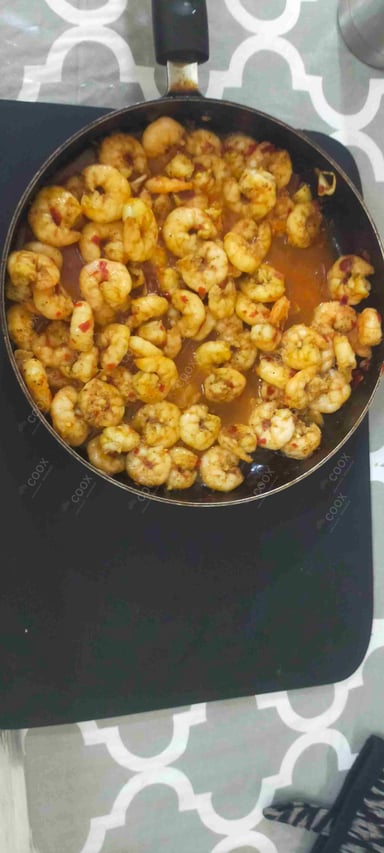 Tasty Butter Garlic Prawns cooked by COOX chefs cooks during occasions parties events at home