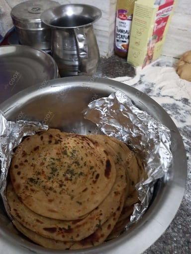 Tasty Tawa Rotis cooked by COOX chefs cooks during occasions parties events at home