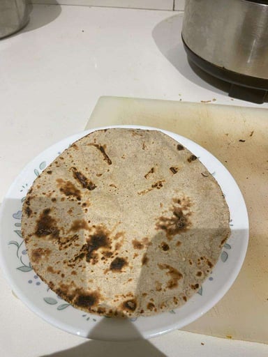 Tasty Tawa Rotis cooked by COOX chefs cooks during occasions parties events at home