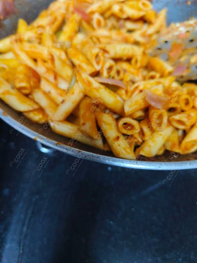 Tasty Pasta in Red Sauce cooked by COOX chefs cooks during occasions parties events at home