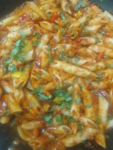 Tasty Pasta in Red Sauce cooked by COOX chefs cooks during occasions parties events at home