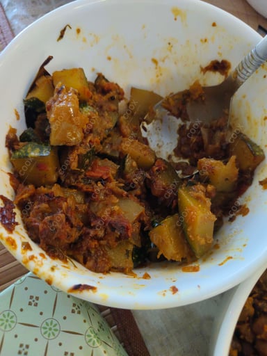 Tasty Kaddu ki Sabzi (Sitafal) cooked by COOX chefs cooks during occasions parties events at home