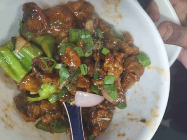 Tasty Chilli Mushroom cooked by COOX chefs cooks during occasions parties events at home