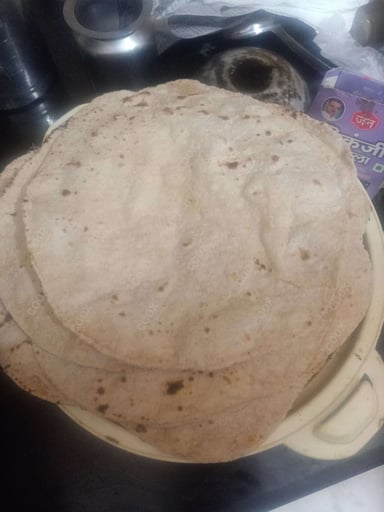 Tasty Tawa Rotis cooked by COOX chefs cooks during occasions parties events at home