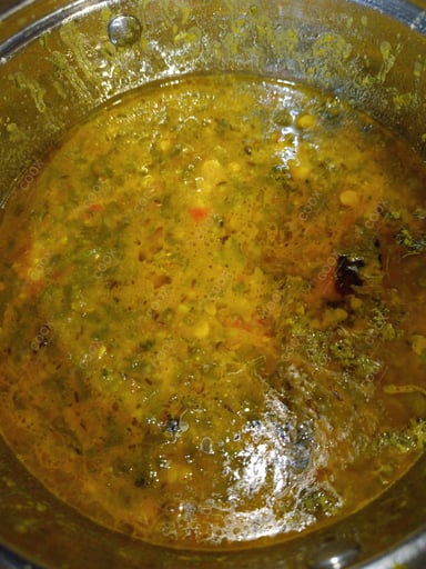 Tasty Palak Dal cooked by COOX chefs cooks during occasions parties events at home