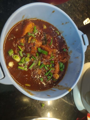Tasty Chicken In Burnt Garlic Sauce cooked by COOX chefs cooks during occasions parties events at home
