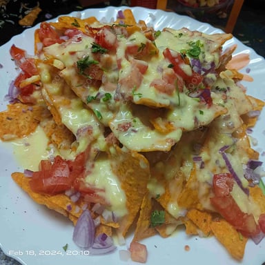 Tasty Cheese Nachos cooked by COOX chefs cooks during occasions parties events at home