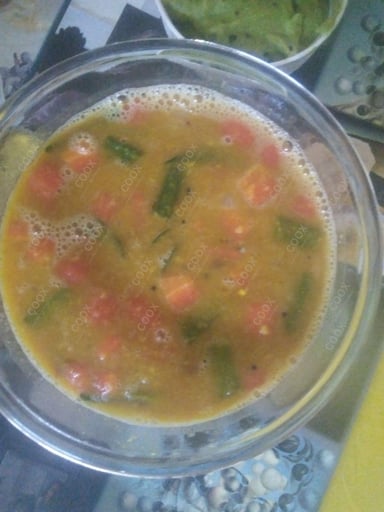 Tasty Sambhar cooked by COOX chefs cooks during occasions parties events at home