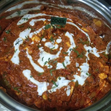 Tasty Kadhai Paneer cooked by COOX chefs cooks during occasions parties events at home