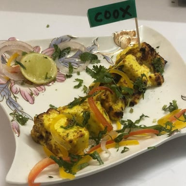Tasty Paneer Tikka cooked by COOX chefs cooks during occasions parties events at home