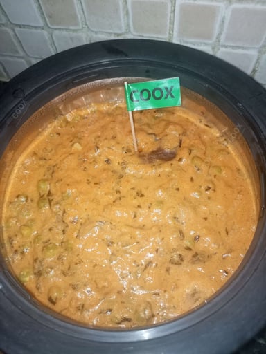 Tasty Methi Matar Malai cooked by COOX chefs cooks during occasions parties events at home