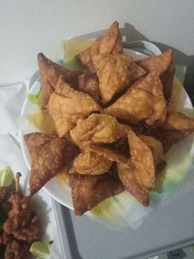 Tasty Keema Samosas cooked by COOX chefs cooks during occasions parties events at home