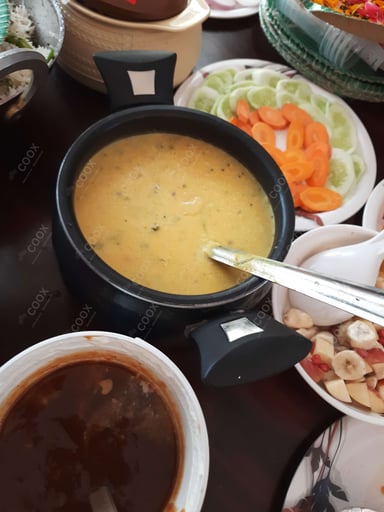 Tasty Kadhi cooked by COOX chefs cooks during occasions parties events at home