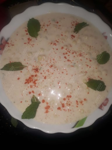 Tasty Boondi Raita cooked by COOX chefs cooks during occasions parties events at home