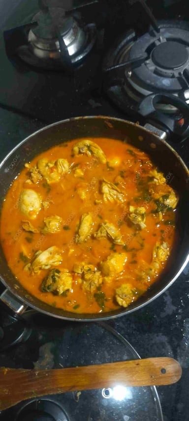 Tasty Chicken Curry cooked by COOX chefs cooks during occasions parties events at home
