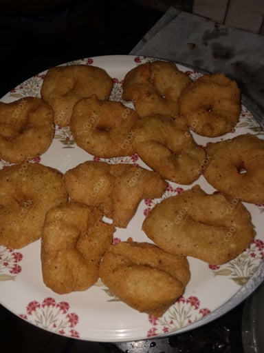 Tasty Medu Vada cooked by COOX chefs cooks during occasions parties events at home