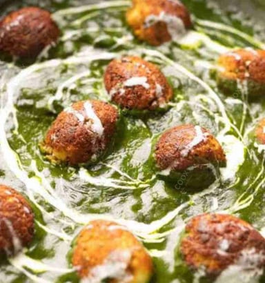 Tasty Palak Kofta cooked by COOX chefs cooks during occasions parties events at home