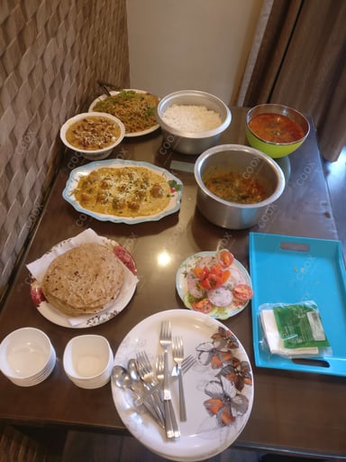 Tasty Moong Dal Halwa cooked by COOX chefs cooks during occasions parties events at home