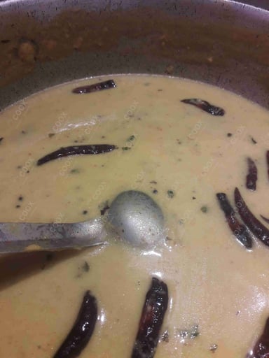 Tasty Kadhi cooked by COOX chefs cooks during occasions parties events at home