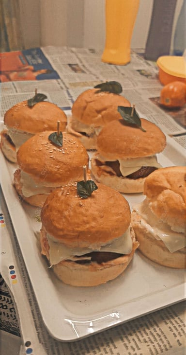 Tasty Mini Veg Burgers cooked by COOX chefs cooks during occasions parties events at home