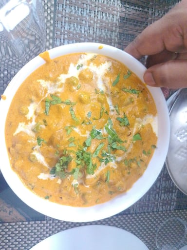 Tasty Matar Mushroom cooked by COOX chefs cooks during occasions parties events at home