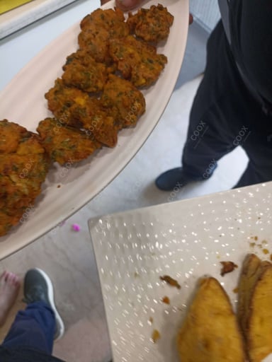 Tasty Mix Pakode cooked by COOX chefs cooks during occasions parties events at home