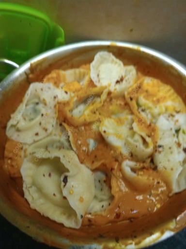 Tasty Ravioli in Pink Sauce cooked by COOX chefs cooks during occasions parties events at home