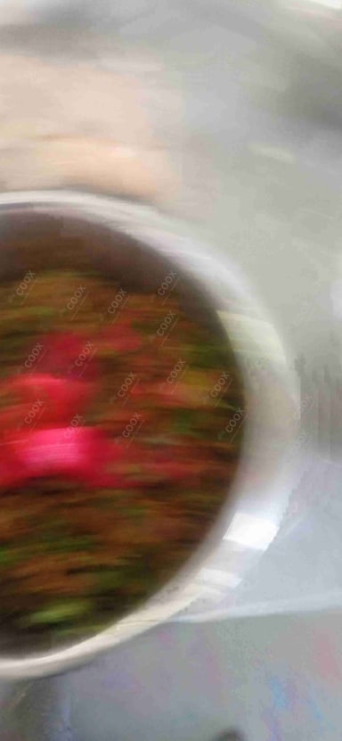 Tasty Bhindi do Pyaza cooked by COOX chefs cooks during occasions parties events at home