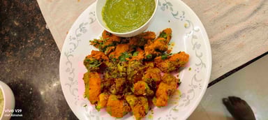 Tasty Chilli Lotus Stem cooked by COOX chefs cooks during occasions parties events at home
