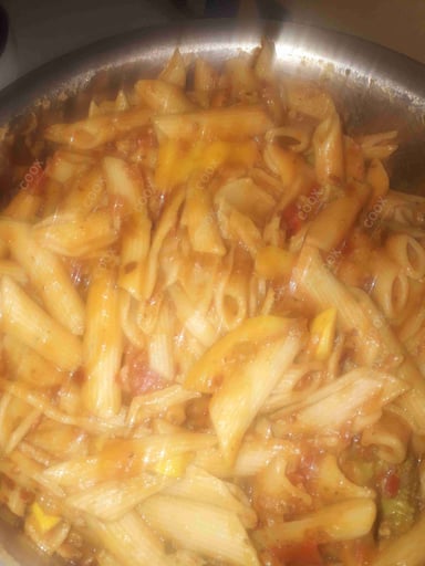 Tasty Pasta in Red Sauce cooked by COOX chefs cooks during occasions parties events at home