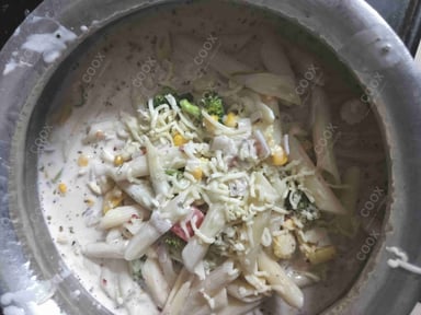 Tasty Chicken Pasta in White Sauce cooked by COOX chefs cooks during occasions parties events at home